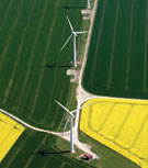 Image:  Aerial view of wind turbines along edges of arable fields